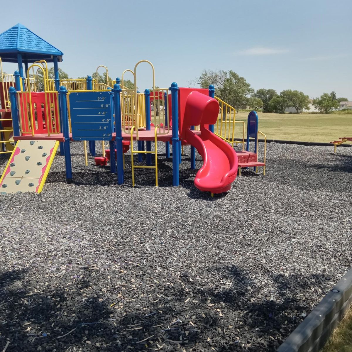 Playground slide and climbing wall